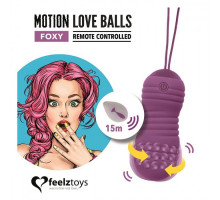 Фиолетовые вагинальные шарики с вращением бусин Remote Controlled Motion Love Balls Foxy